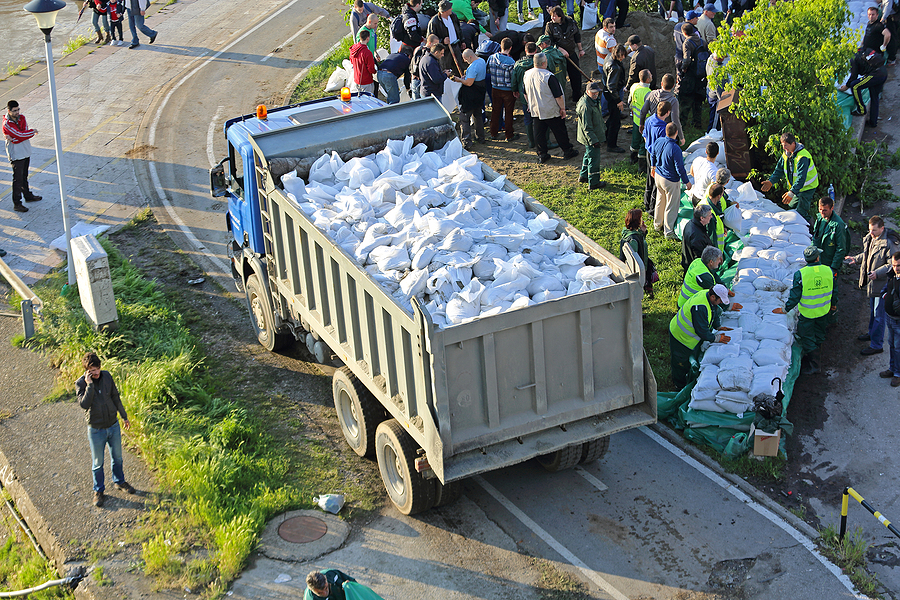 A Sense of Community. A truck delivering sandbags