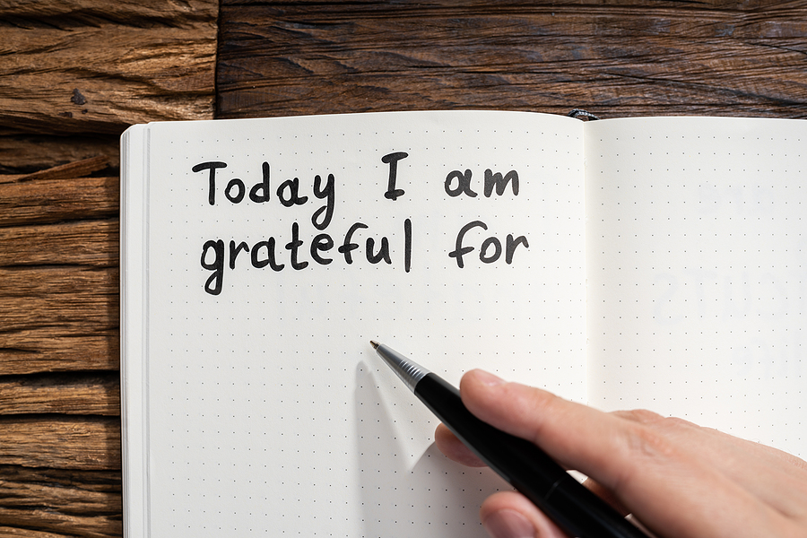 Inspirational Resolutions for 2023
Gratitude Journal Concept. Writing I Am Grateful In Journal